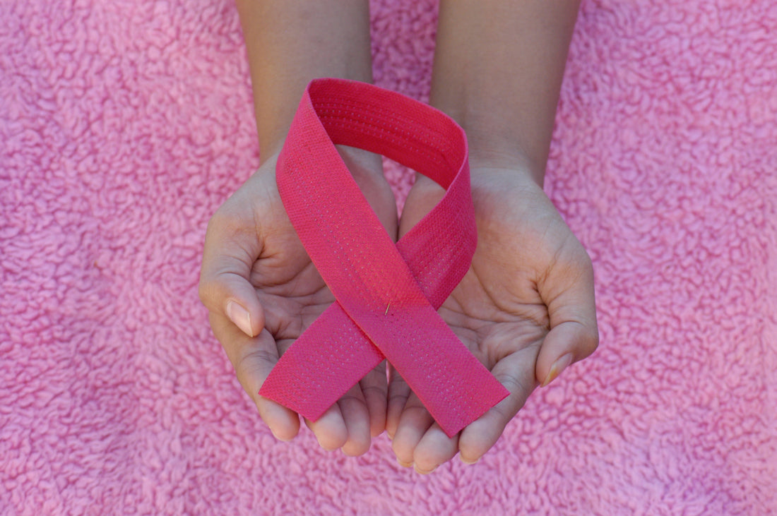 Image of Pink Ribbon being held
